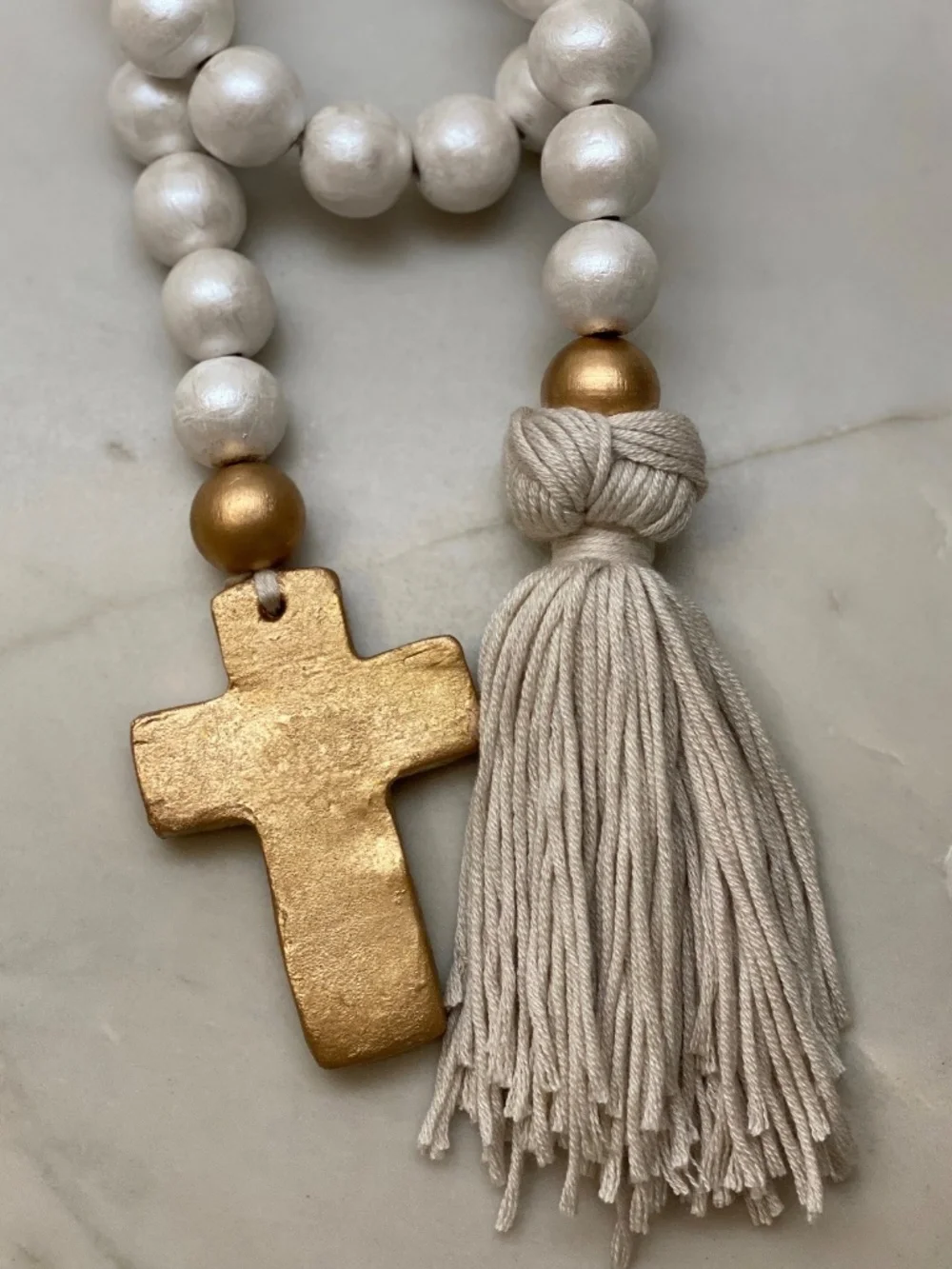 Small Blessing Bead Garland with Cross and Tassel  Materials: Wood  Beads, Clay,